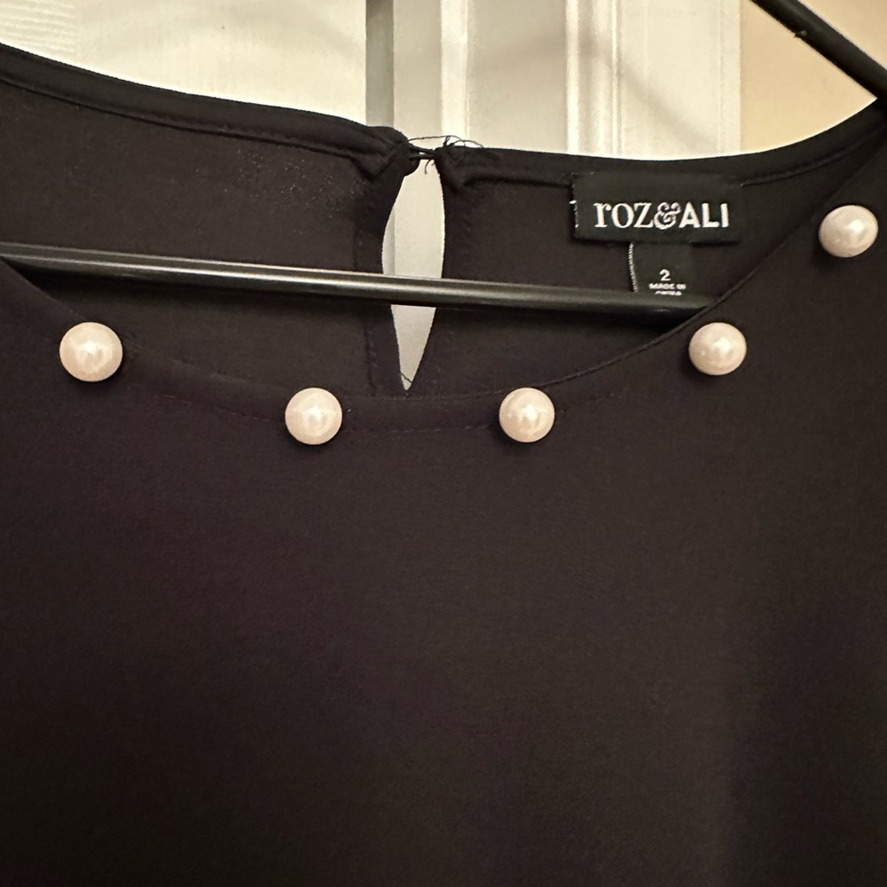 Dress.  Size 2.  Black with Pearl detail.